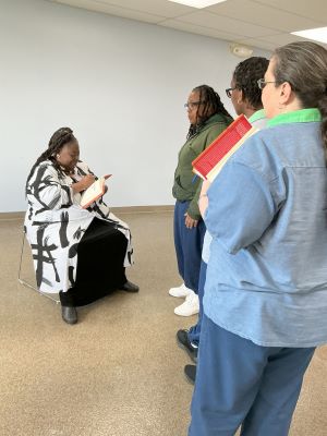Loretta Ross signing autographs at ORW event