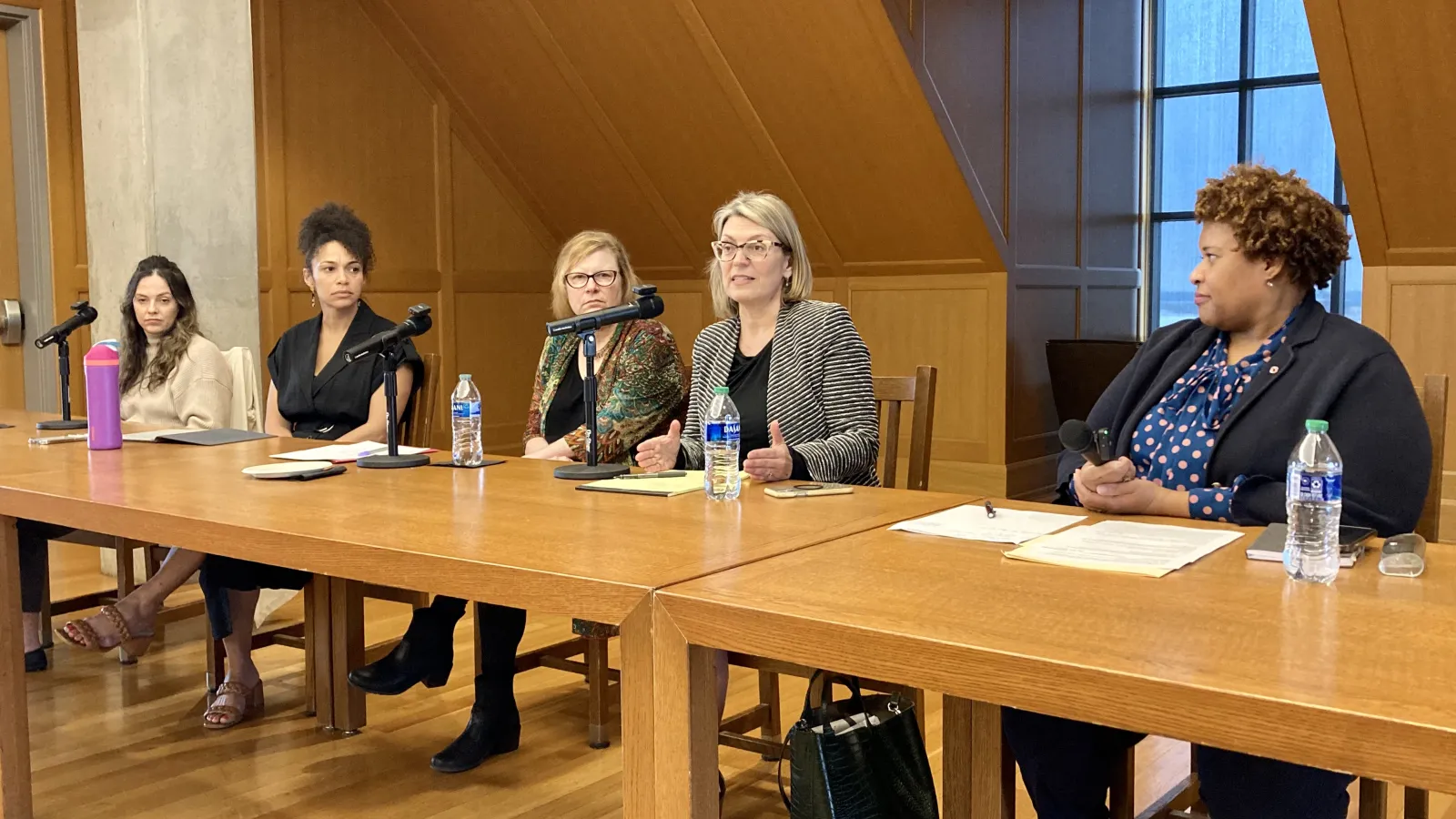 Photo of speakers at table