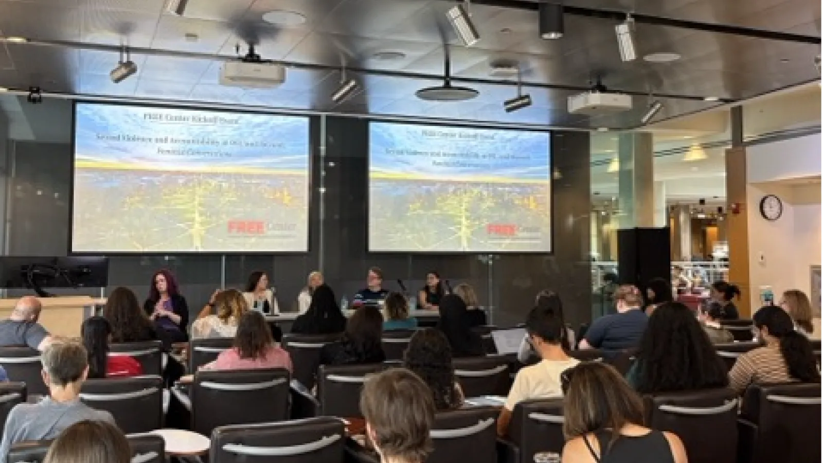 Audience Viewing a Panel Discussion