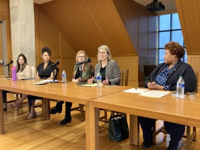 Photo of speakers at table