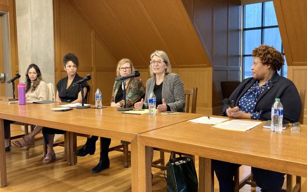 Photo of speakers at table