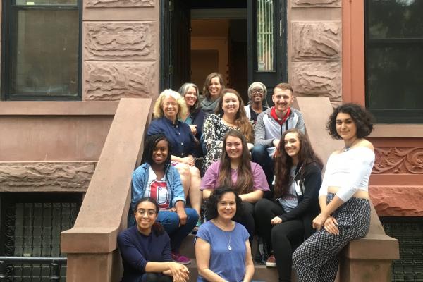 OSU faculty and students sitting on building steps in New York City.