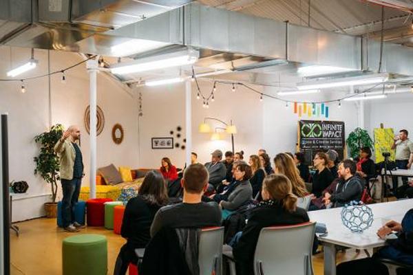 Person giving a presentation at the STEAM Factory.