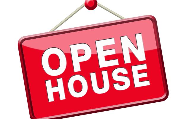 Picture of a red sign that says Open House.