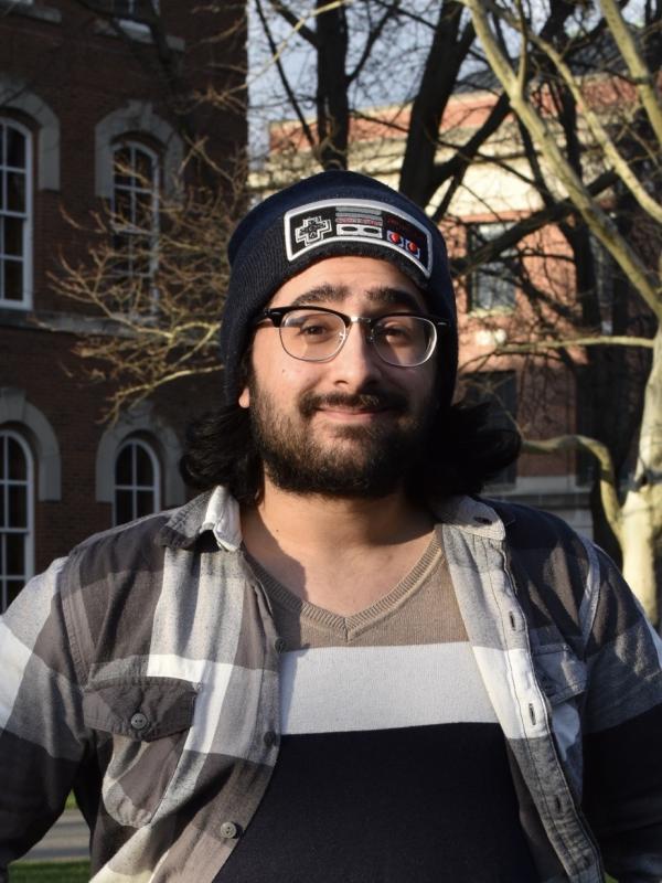 A photo of Ali Alkhalifa outside of University Hall