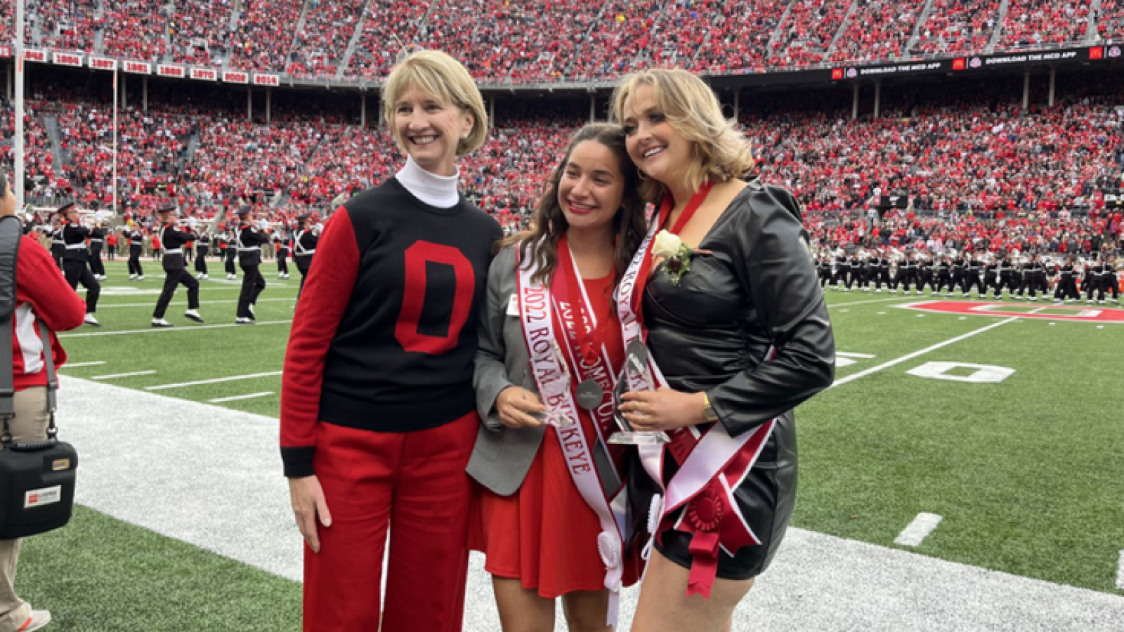 WGSS minor and Homecoming Royalty Kelsey Lowman alongside fellow Homecoming Royalty Shayna Kling and Ohio State President Kristina Johnson